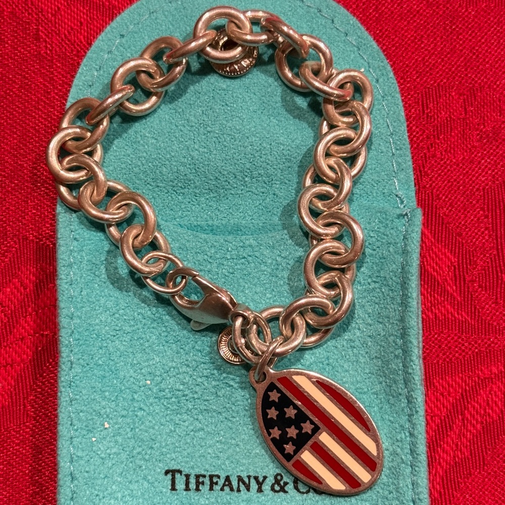 Tiffany sterling silver bracelet with oval American flag charm honoring 9/11